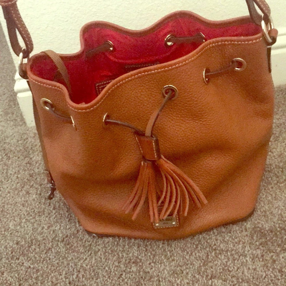 Tan pebble leather Dooney and Bourke bag.